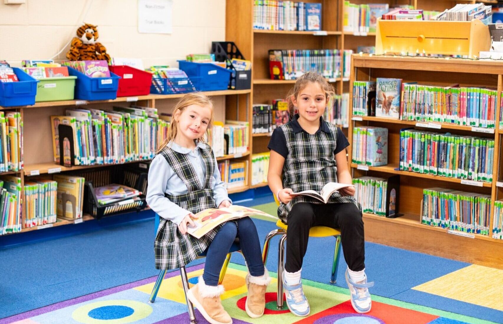 Girls reading in library